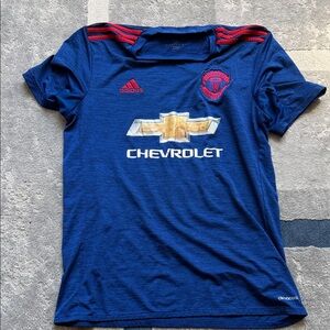 adidas Manchester United  Soccer Jersey with Red Details and Gold Sponsor Logo